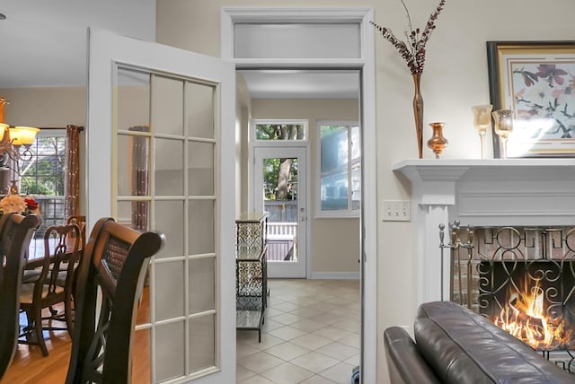 652 Spinner Cir, Mount Pleasant, SC 29464 - tiled living area featuring a stone fireplace and baseboards