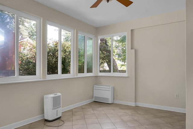 652 Spinner Cir, Mount Pleasant, SC 29464 - unfurnished sunroom featuring heating unit and tile patterned floors