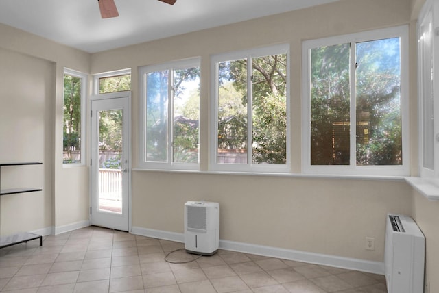 652 Spinner Cir, Mount Pleasant, SC 29464 - unfurnished sunroom with healthy amount of natural light and tile patterned floors