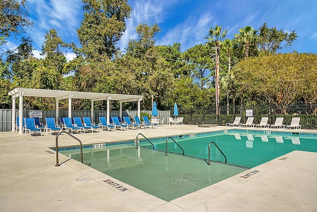 652 Spinner Cir, Mount Pleasant, SC 29464 - community pool featuring a pergola, a patio, and view of wooded area