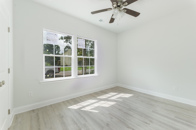 unfurnished room with light hardwood / wood-style floors and ceiling fan