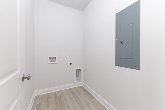 washroom with electric dryer hookup, light wood-type flooring, and washer hookup