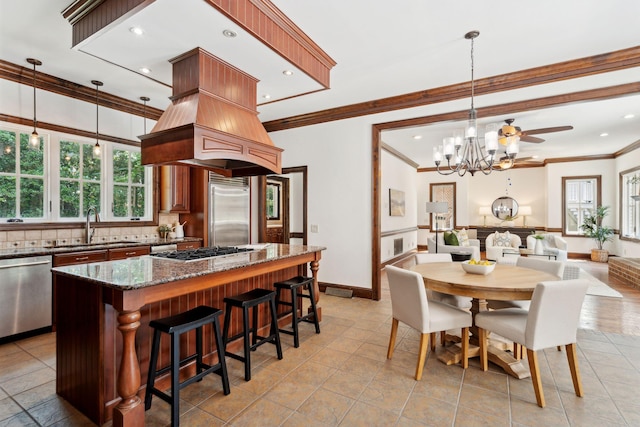 125 Drayton Dr, Summerville, SC 29483 - dining area featuring crown molding, a chandelier, baseboards, recessed lighting, and light tile patterned flooring