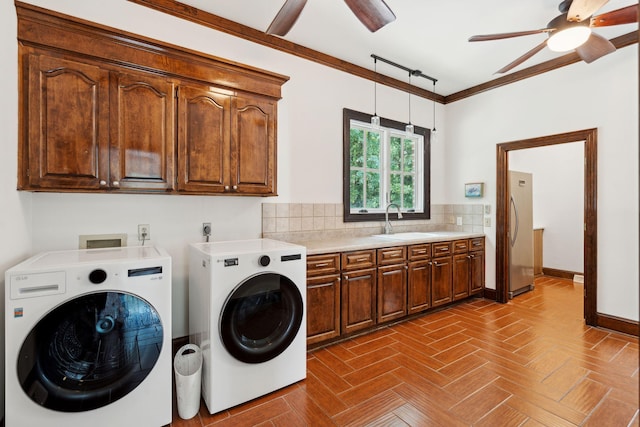 125 Drayton Dr, Summerville, SC 29483 - laundry area with ceiling fan, cabinet space, independent washer and dryer, baseboards, and ornamental molding