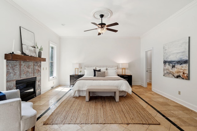 125 Drayton Dr, Summerville, SC 29483 - bedroom with inlaid floor details, crown molding, baseboards, a glass covered fireplace, and a ceiling fan