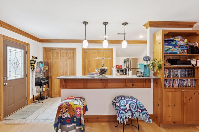 125 Drayton Dr, Summerville, SC 29483 - kitchen with pendant lighting and freestanding refrigerator