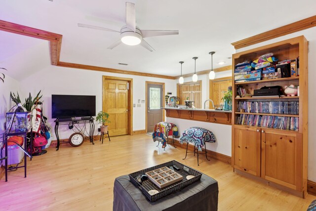 125 Drayton Dr, Summerville, SC 29483 - living area featuring crown molding, light wood-style flooring, ceiling fan, and baseboards