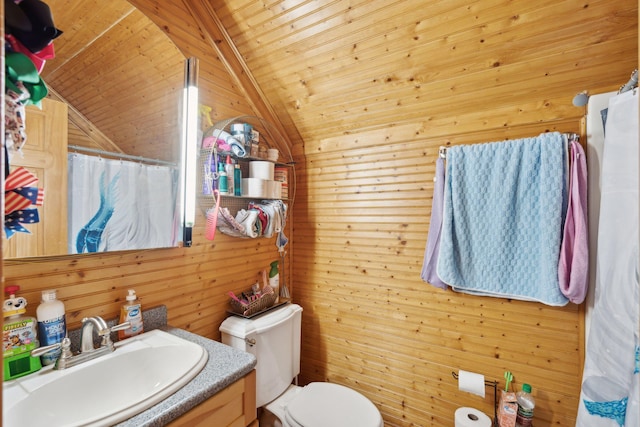 125 Drayton Dr, Summerville, SC 29483 - bathroom featuring toilet, vanity, wooden walls, vaulted ceiling, and a shower with curtain
