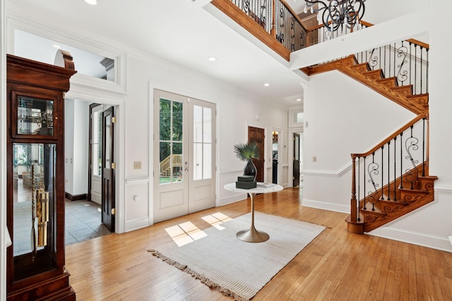 125 Drayton Dr, Summerville, SC 29483 - foyer entrance featuring stairway, light wood-type flooring, crown molding, recessed lighting, and a chandelier