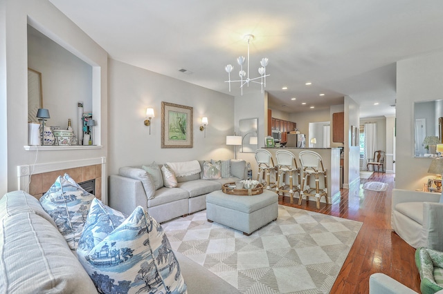 1723 Brittlebush Ln, Johns Island, SC 29455 - living area with a chandelier, light wood finished floors, recessed lighting, and a fireplace