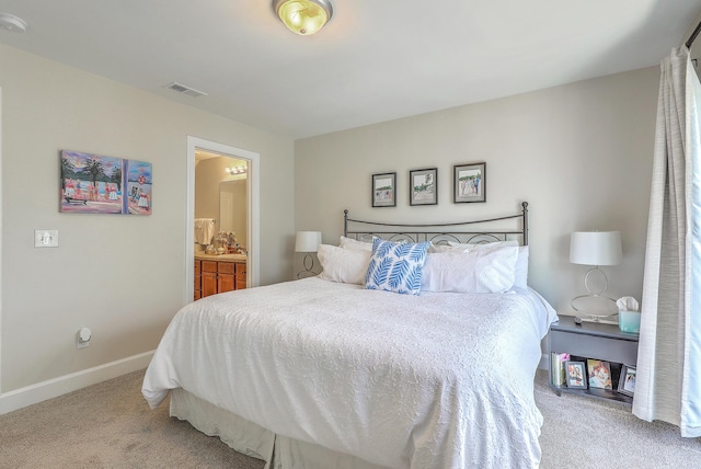 1723 Brittlebush Ln, Johns Island, SC 29455 - carpeted bedroom with baseboards and ensuite bath