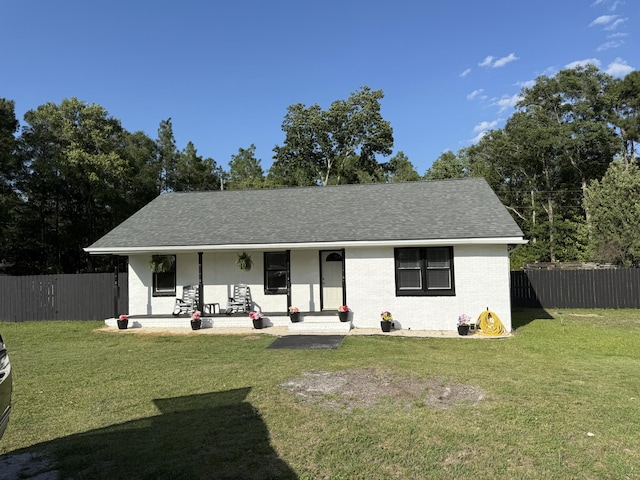 304 Carolina Cir, Walterboro, SC 29488 - view of front of house with a shingled roof, brick siding, and covered porch