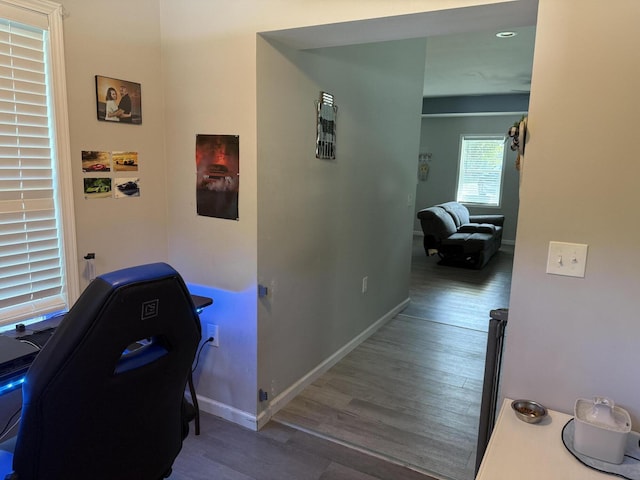 304 Carolina Cir, Walterboro, SC 29488 - corridor with wood finished floors, a desk, baseboards, and recessed lighting