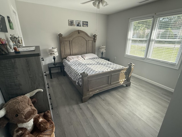 304 Carolina Cir, Walterboro, SC 29488 - bedroom featuring light wood-style flooring and baseboards