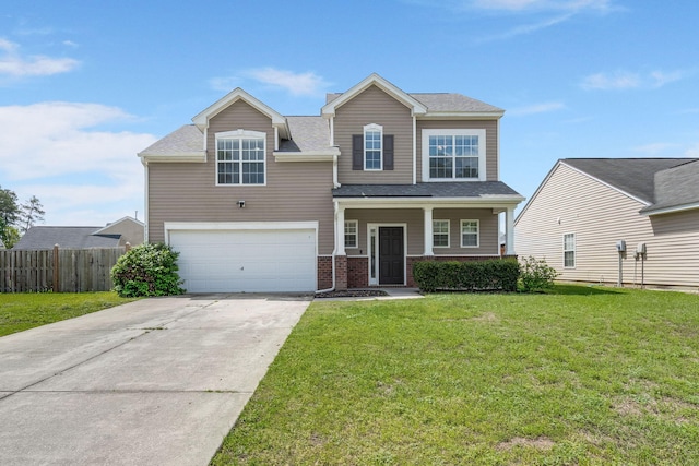 9731 Stockport Cir, Summerville, SC 29485 - view of front of property with concrete driveway, an attached garage, a front lawn, brick siding, and fence