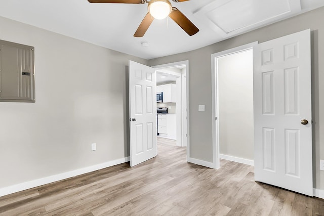 1979 Macon Ave, North Charleston, SC 29405 - unfurnished bedroom with electric panel, light wood-type flooring, baseboards, and a ceiling fan