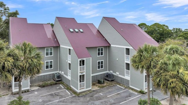 202 Mariners Cay Dr, Folly Beach, SC 29439 - back of property with uncovered parking and a metal roof