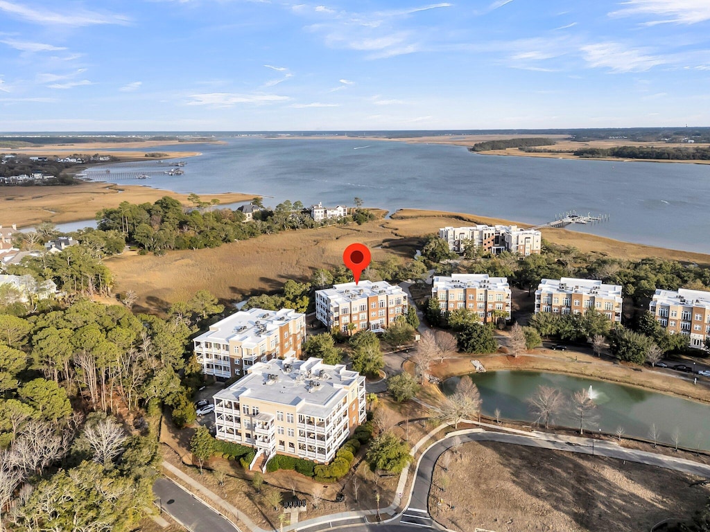 birds eye view of property featuring a water view