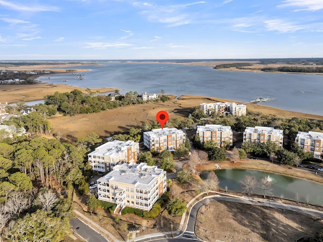 birds eye view of property featuring a water view