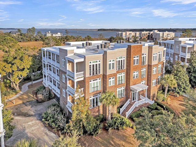 view of building exterior with a water view