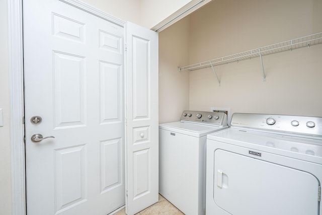 laundry room featuring washer and dryer