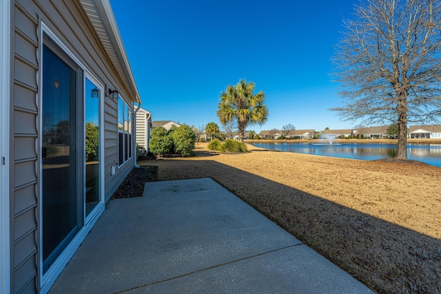 view of yard with a water view