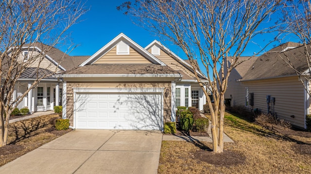 view of front of property featuring a garage