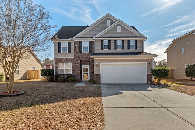 view of front of property with a garage