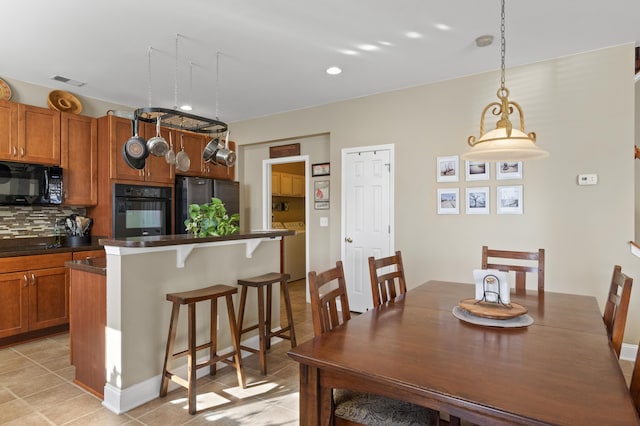 view of tiled dining space