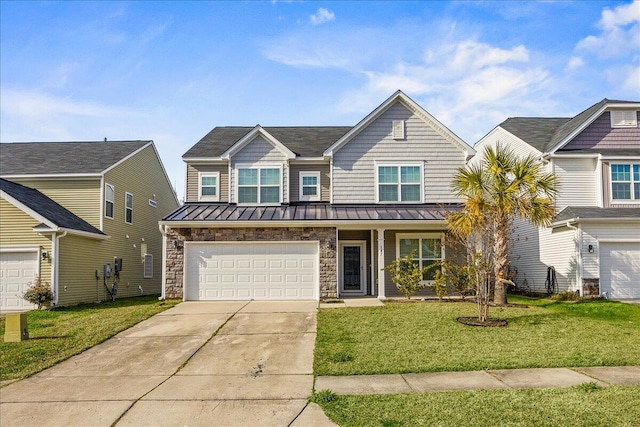 view of front of house with a garage and a front lawn