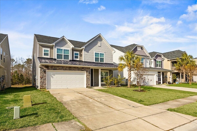 view of front of home featuring a front yard and a garage