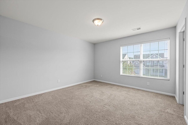 view of carpeted spare room