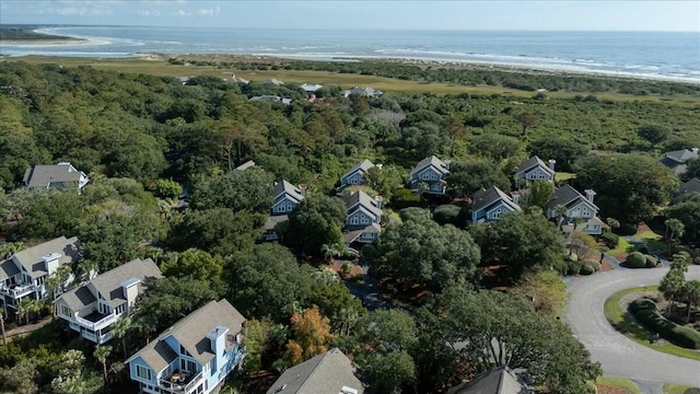 bird's eye view featuring a beach view and a water view