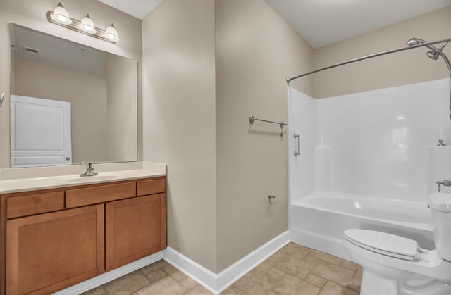 full bath with visible vents, shower / bathing tub combination, toilet, vanity, and baseboards