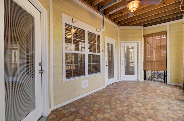 view of patio with ceiling fan