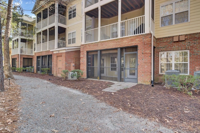 view of building exterior featuring ac unit