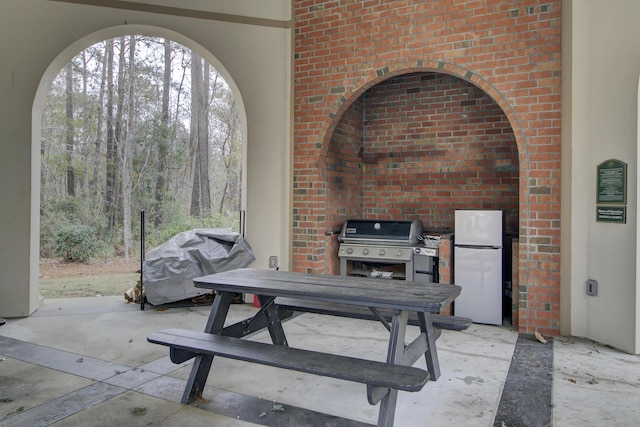 view of patio / terrace with outdoor dining space and area for grilling