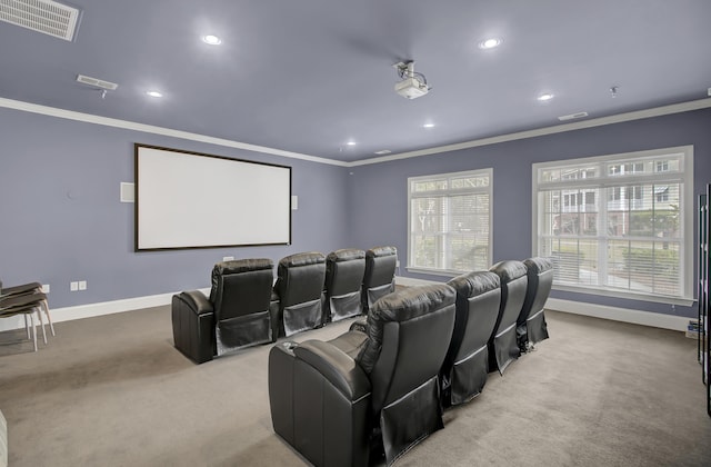 carpeted cinema room featuring recessed lighting, baseboards, visible vents, and ornamental molding