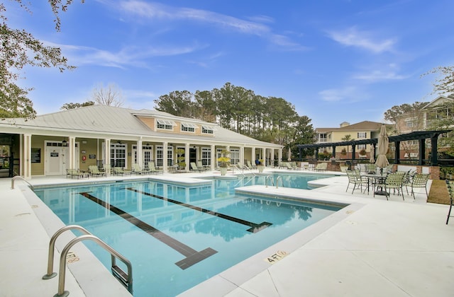 pool with a patio area