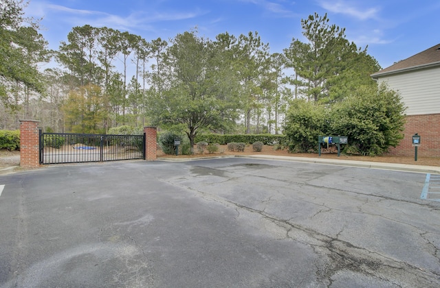 exterior space featuring a gate