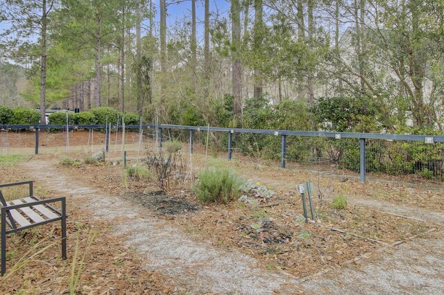 view of yard featuring fence