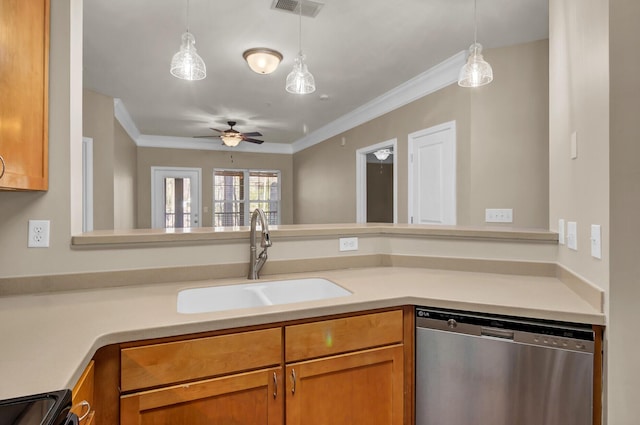 kitchen with light countertops, visible vents, dishwasher, and a sink