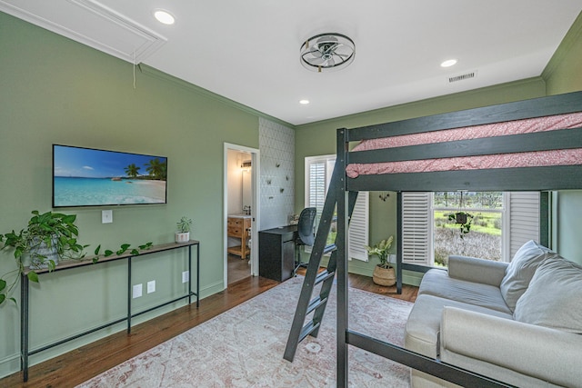 1520 Regimental Ln, Johns Island, SC 29455 - bedroom featuring attic access, crown molding, wood finished floors, connected bathroom, and recessed lighting