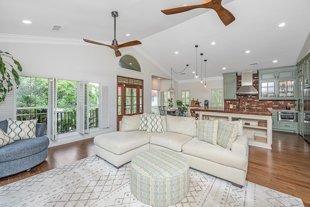 1520 Regimental Ln, Johns Island, SC 29455 - living area featuring ceiling fan, wood finished floors, high vaulted ceiling, recessed lighting, and crown molding