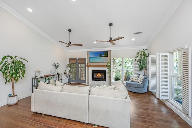 1520 Regimental Ln, Johns Island, SC 29455 - living room featuring a ceiling fan, crown molding, dark wood finished floors, a glass covered fireplace, and recessed lighting