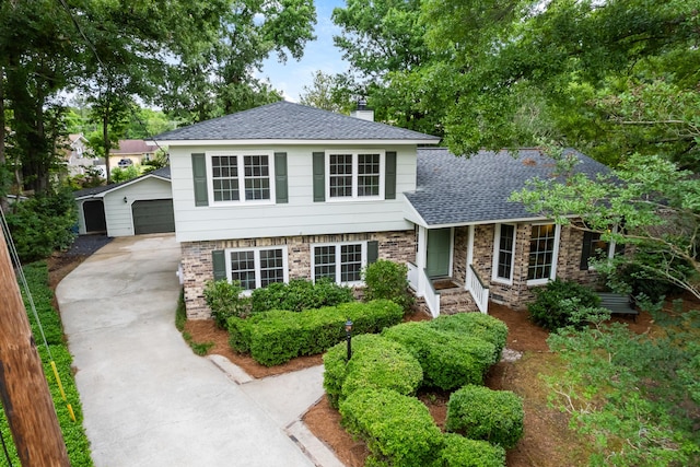 886 Friendly Cir, Charleston, SC 29414 - view of front of property featuring a shingled roof, an outbuilding, a chimney, a garage, and concrete driveway