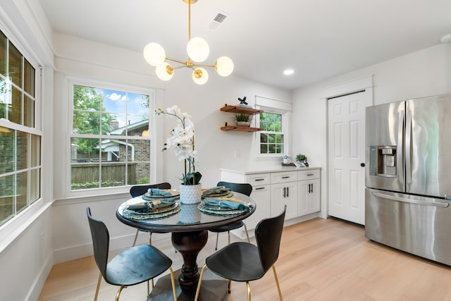 886 Friendly Cir, Charleston, SC 29414 - dining space featuring a chandelier, plenty of natural light, light wood-style flooring, baseboards, and recessed lighting