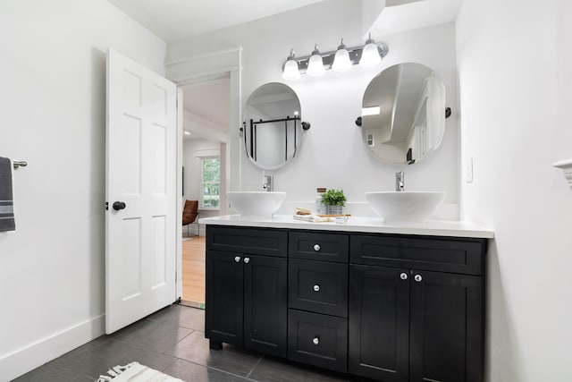 886 Friendly Cir, Charleston, SC 29414 - bathroom with double vanity and baseboards