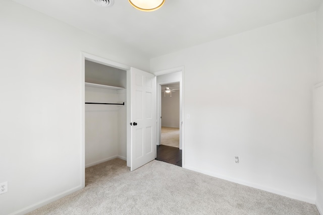 886 Friendly Cir, Charleston, SC 29414 - unfurnished bedroom with carpet flooring, baseboards, and a closet