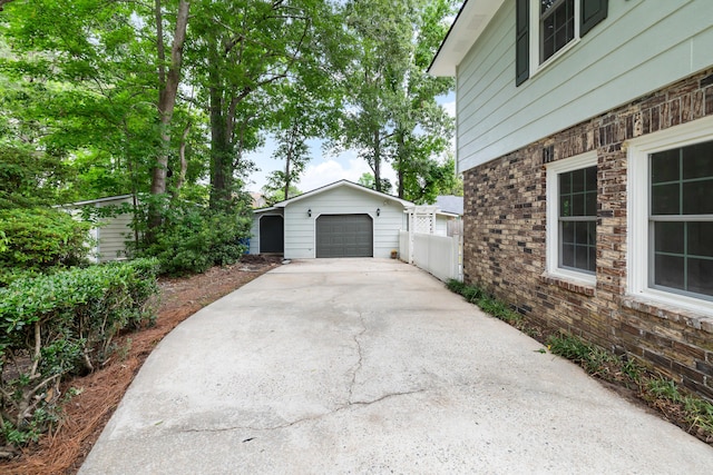 886 Friendly Cir, Charleston, SC 29414 - detached garage featuring concrete driveway